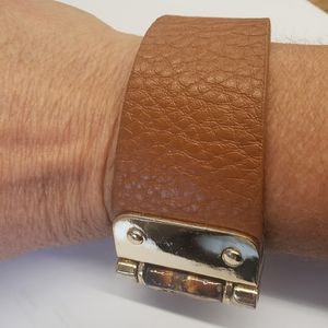 Brown leather bracelet.
